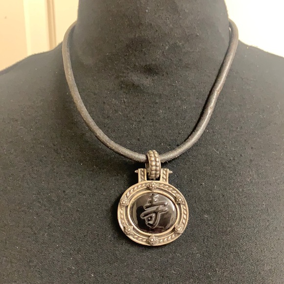 Silver andblack necklace with design. - Picture 1 of 7